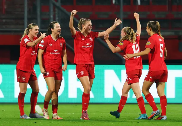 FC Twente's Eva Elberink and teammates celebrate their first goal scored by FC Twente's Danique Van Ginkel