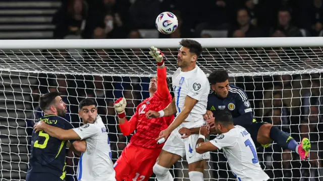 Greece clear a corner