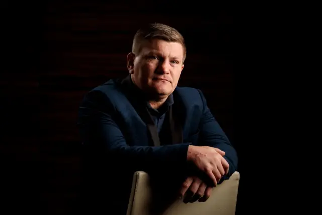 Ricky Hatton, who is wearing a blue blazer and shirt, is staring at the camera in this photograph following the Ultimate Boxxer Brand Launch at the ME Hotel London