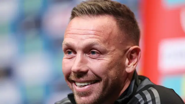 Craig Bellamy in a Wales news conference