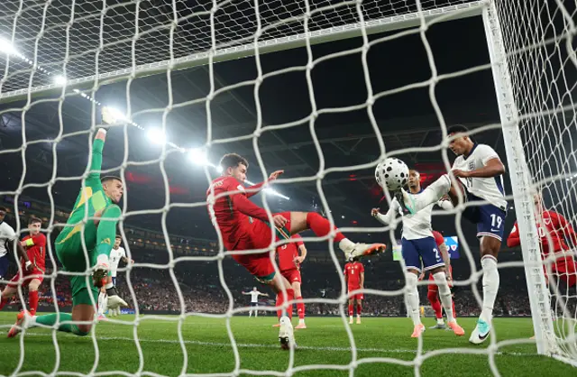 Ollie Watkins of England scores