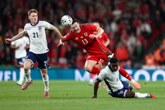 Marc Guéhi of England is booked following a foul on Kieffer Moore