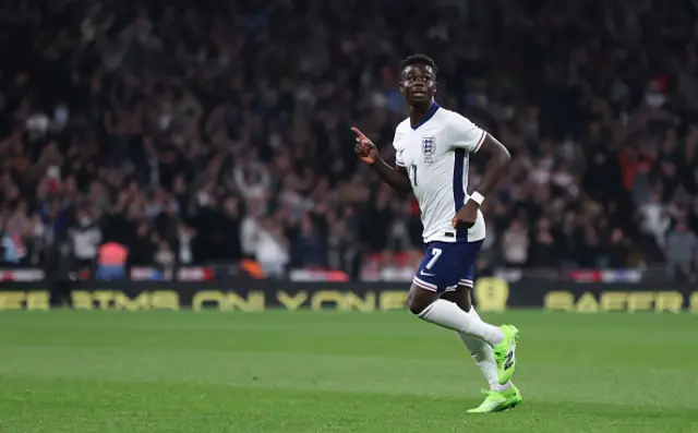 England's Bukayo Saka celebrates scoring