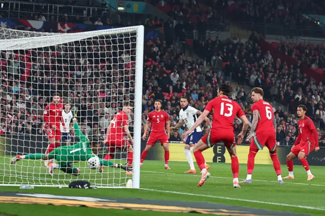 Morgan Rogers of England scores