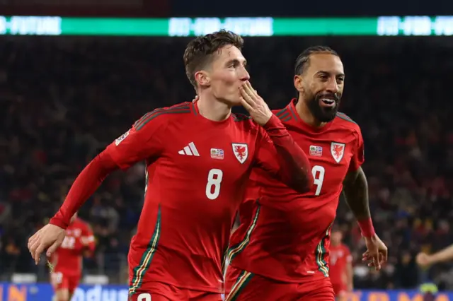 Wingers Harry Wilson and Sorba Thomas celebrate Wales' fourth goal in the win against Iceland in Cardiff in November
