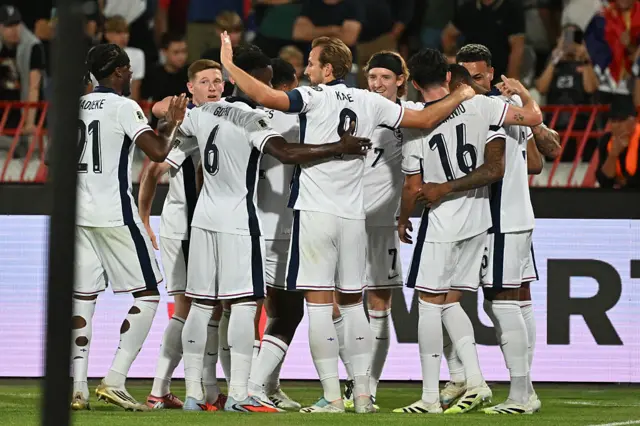 England celebrate scoring a goal in the World Cup qualifier against Serbia on 9 September