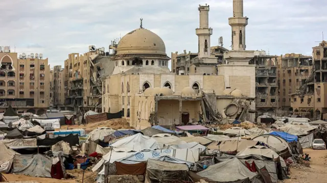 over a dozen tents pitched in front of damaged mosque