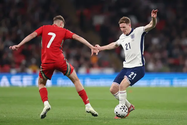 Elliot Anderson of England is challenged by David Brooks