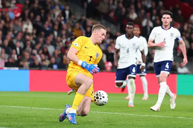 Jordan Pickford of England makes a save