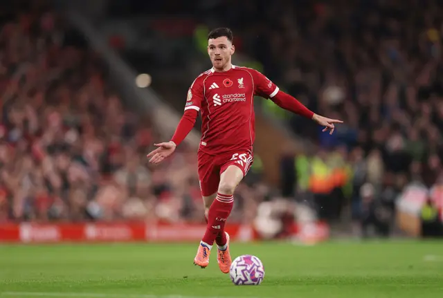 Andrew Robertson of Liverpool runs with the ball during the Premier League match between Liverpool and Aston Villa at Anfield on November 01, 2025 in Liverpool, England.