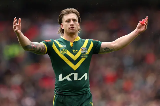 Cameron Munster of Australia looks on