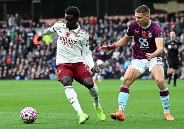 Bukayo Saka and Maxime Esteve