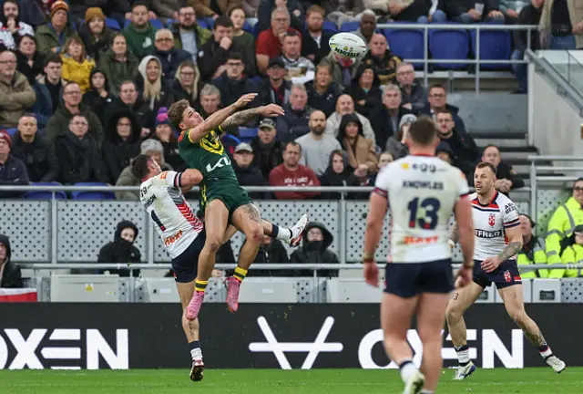 Australia's Reece Walsh flicks the ball back