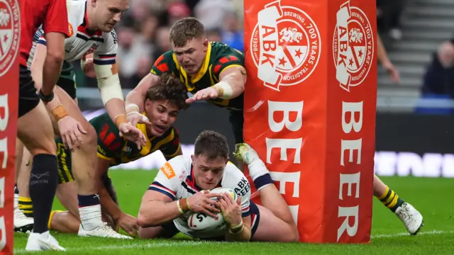 Morgan Knowles grounds the ball