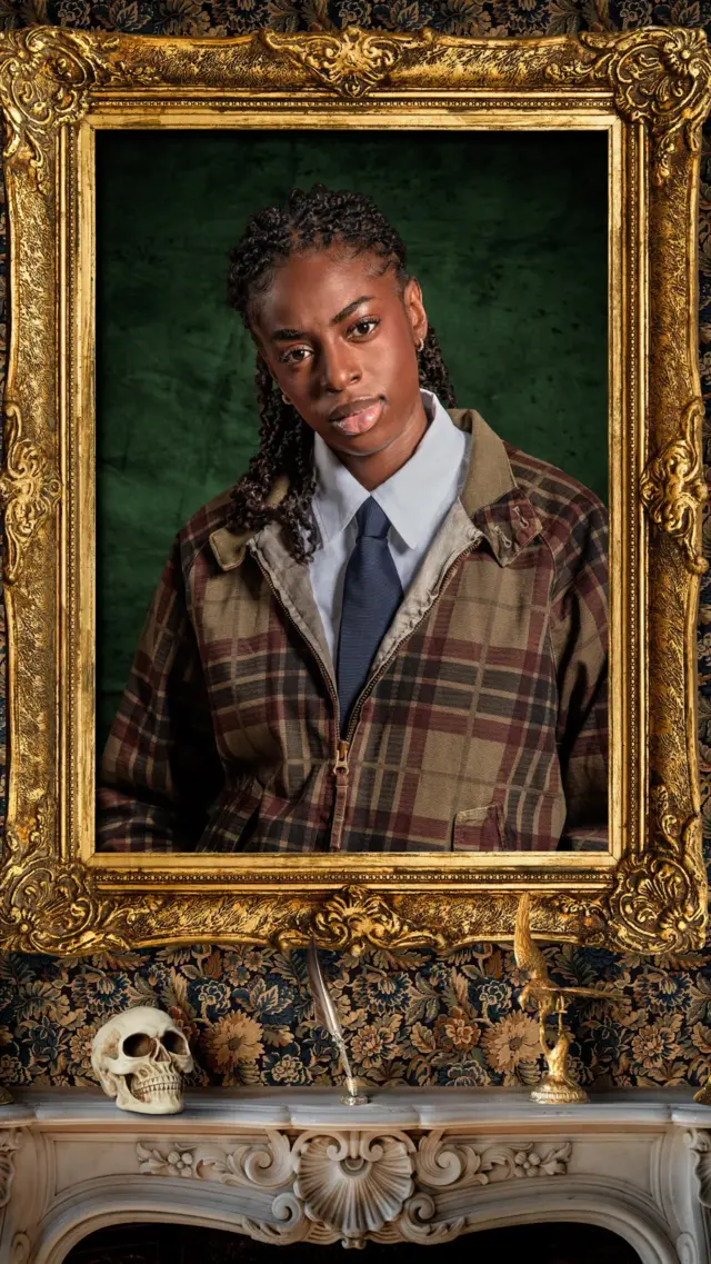 Cat Burns' portrait in a golden frame, as seen in The Traitors