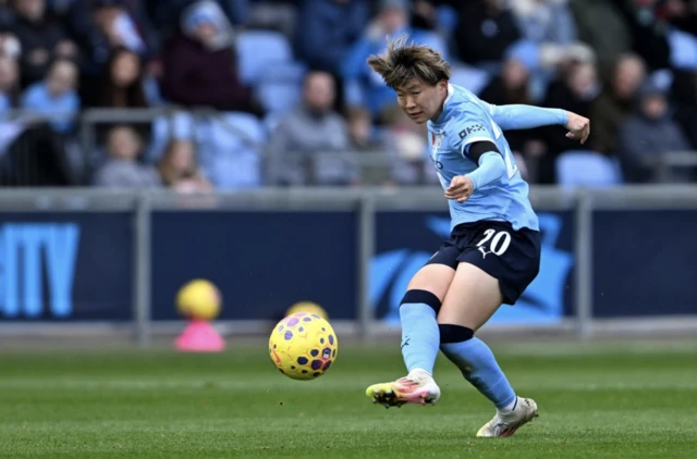 Manchester City's Aoba Fujino shoots