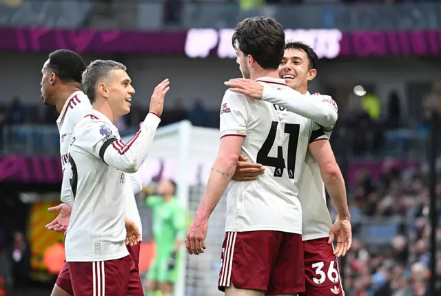 Declan Rice of Arsenal celebrates scoring his team's second goal with teammates Leandro Trossard and Martin Zubimendi during the Premier League match between Burnley and Arsenal at Turf Moor on November 01, 2025 in Burnley, England.