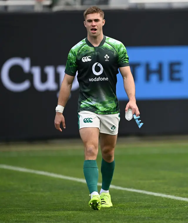 Jack Crowley warms up ahead of the game