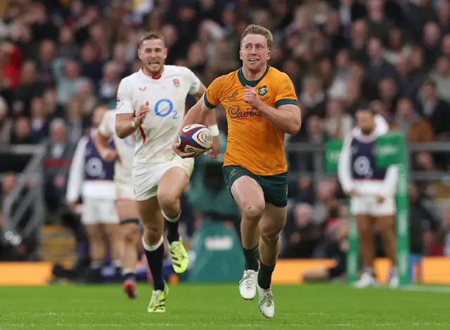 Harry Potter scoring a try