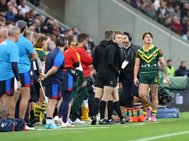 Reece Walsh (R) of Australia reacts