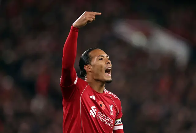 Virgil van Dijk of Liverpool shouts instructions during the Premier League match between Liverpool and Aston Villa at Anfield on November 01, 2025 in Liverpool, England.