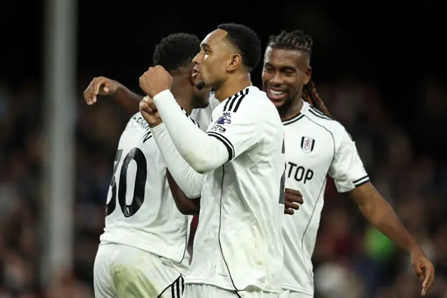 Kenny Tete, Ryan Sessegnon and Alex Iwobi of Fulham celebrates their team's third goal,