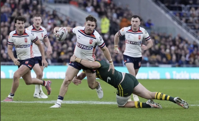 England's AJ Brimson (left) and Australia's Lindsay Smith in action