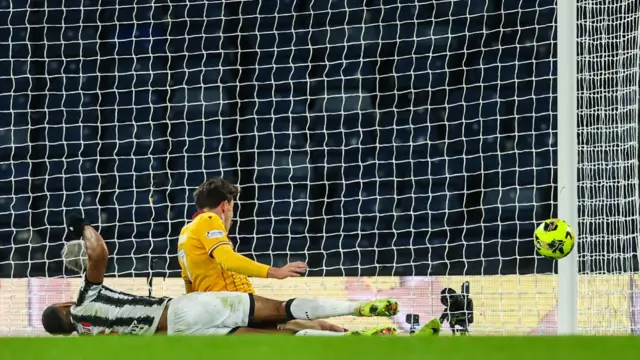 A strike by St Mirren's Mikael Mandron (L) comes off the post during a Premier Sports Cup Semi-Final match between Motherwell and St Mirren at Hampden Park