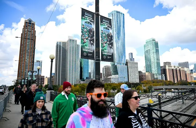 Fans arrive at the game