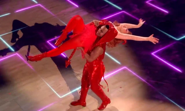 Dancers in devil costumes