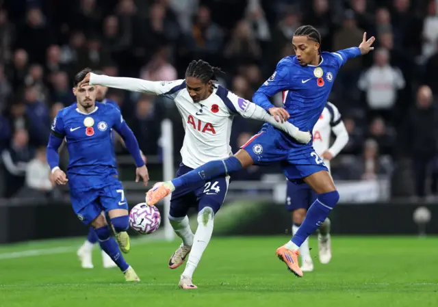 Tottenham Hotspur's Djed Spence in action with Chelsea's Joao Pedro