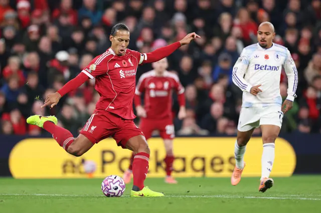 Virgil van Dijk of Liverpool passes the ball during the Premier League match between Liverpool and Aston Villa at Anfield on November 01, 2025 in Liverpool, England.