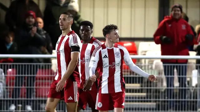Brackley's Callum Stewart celebrates his equaliser against Notts County