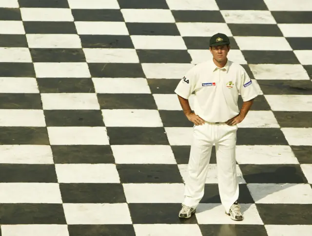 Ricky Ponting standing on chequered tiles