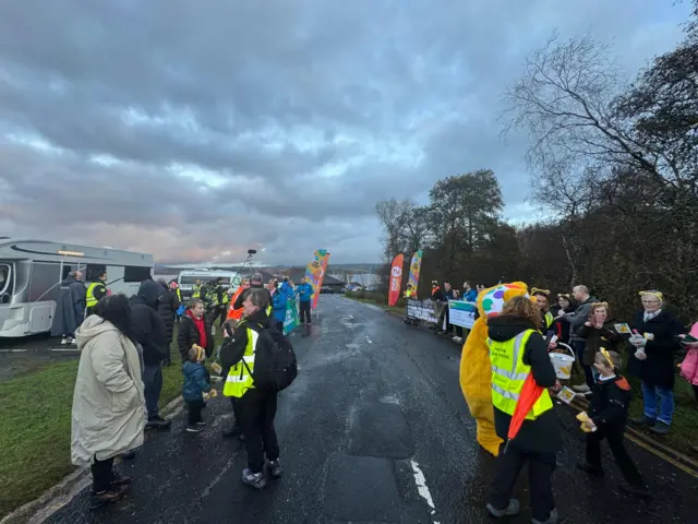 supporters at the starting line