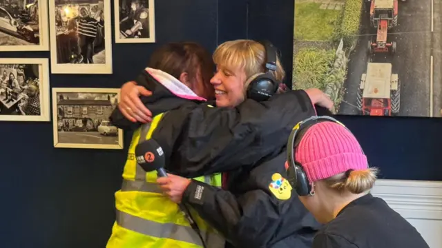 Sara and Clare hug