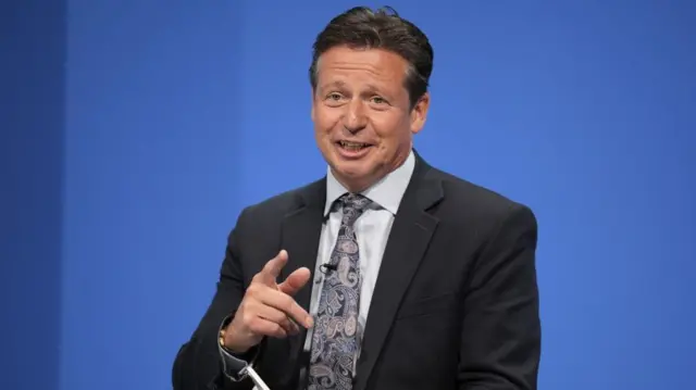 Shadow culture secretary Nigel Huddleston on stage