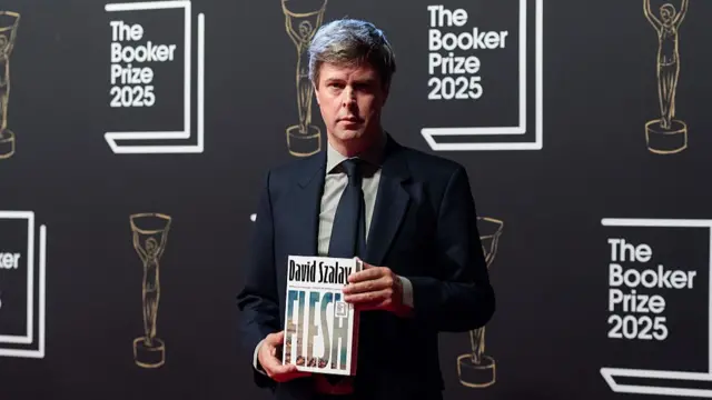 Hungarian-British author David Szalay with his book 'Flesh