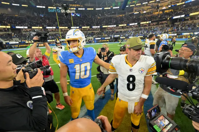 Aaron Rodgers and Chargers quarterback  Justin Herbert