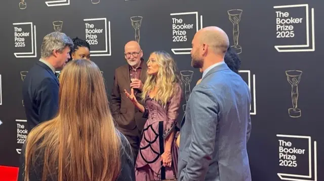 The winner chatting to the judging panel