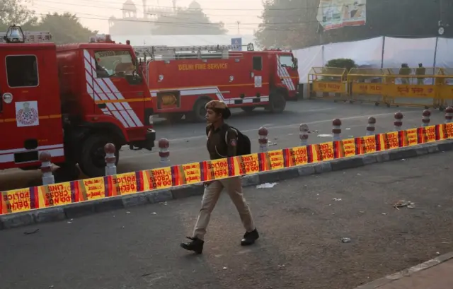 general Investigators at the scene of an explosion in Delhi, where the wreckage of vehicles remains this morning
