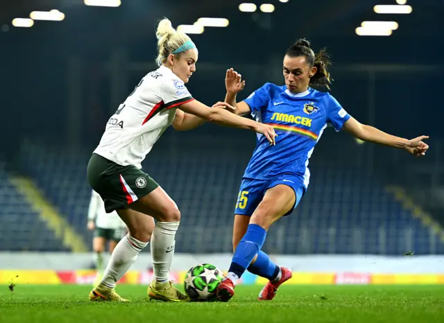 Ellie Carpenter of Chelsea battles for possession with Agathe Ollivier of St. Poelten