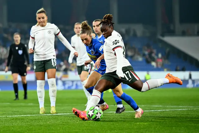 Sandy Baltimore of Chelsea crosses the ball whilst under pressure from Izabela Krizaj of St. Poelten during the UEFA Women's Champions League 2025/26 League Phase MD3 match between SKN St.Pölten and Chelsea FC Women