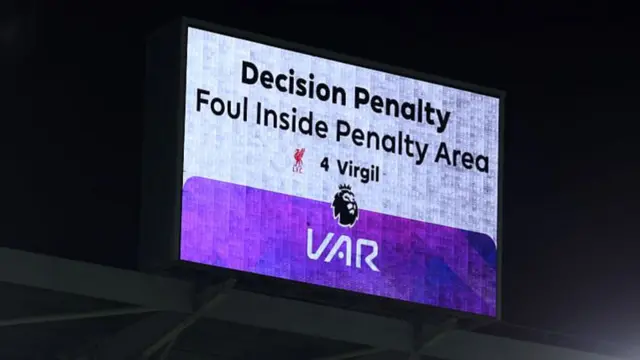 Screen at Brentford showing the VAR decision to award Brentford a penalty for Virgil van Dijk's tackle on Dango Ouattara