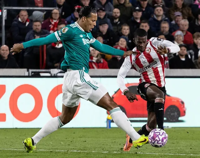 Liverpool's Virgil van Dijk tackles Brentford's Dango Ouattara