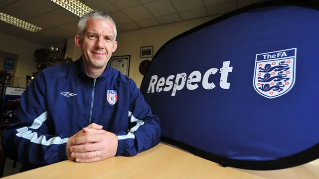 Chris Foy and the FA Respect banner