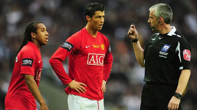 Chris Foy showing the whistle to Cristiano Ronaldo in the 2009 League Cup final