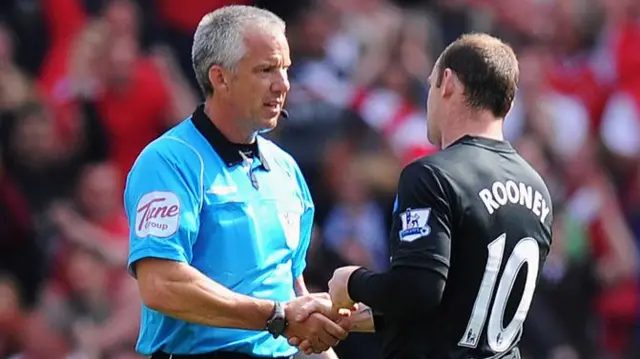 Chris Foy and Wayne Rooney