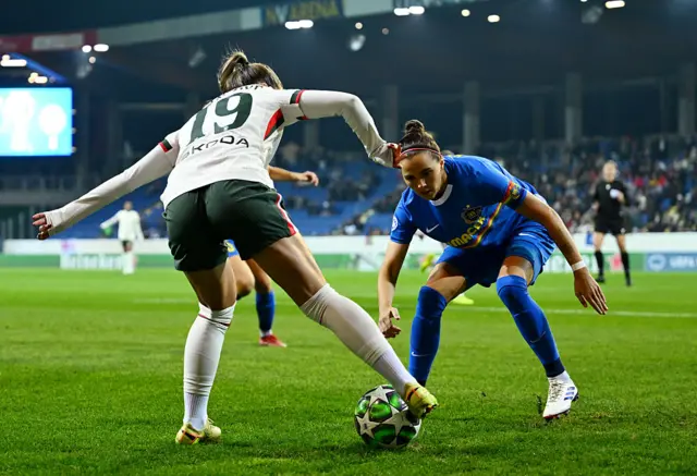 Jennifer Klein of St. Poelten battles for possession with Johanna Rytting Kaneryd of Chelsea during the UEFA Women's Champions League 2025/26 League Phase MD3 match between SKN St.Pölten and Chelsea FC Women at NÖ Arena on November 11, 2025 in St. Poelten, Austria.