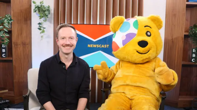 Adam Fleming and Pudsey Bear
